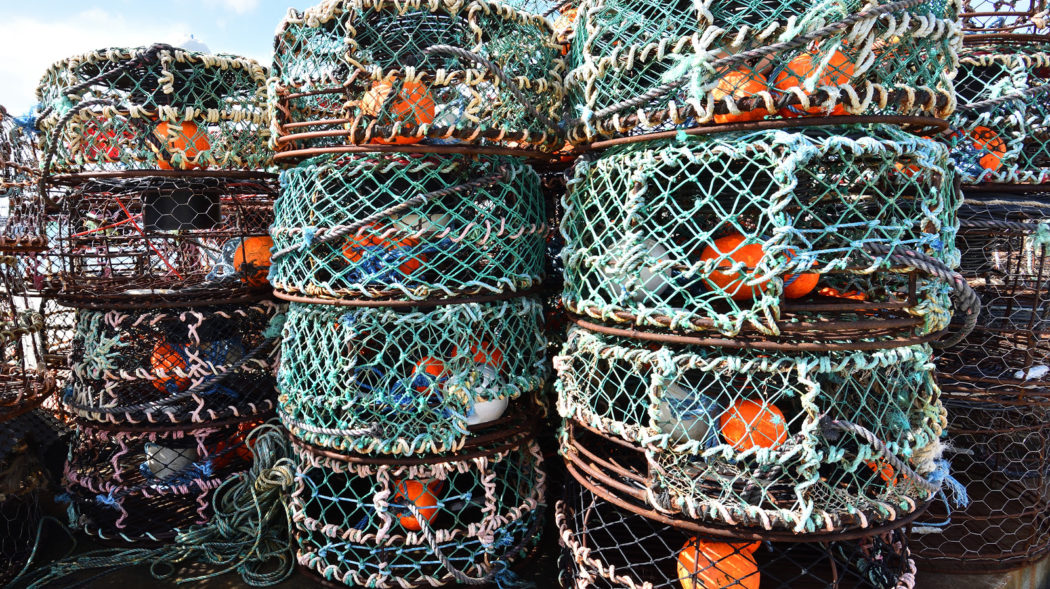Fish trap stacked up along the harbour at Apollo Bay, Victoria, Australia