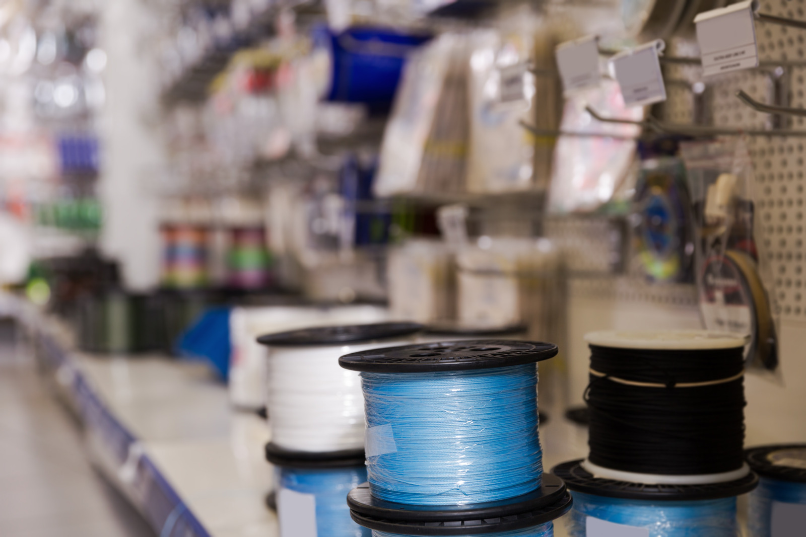 Close-up photo of variety fishing line in the fishing shop